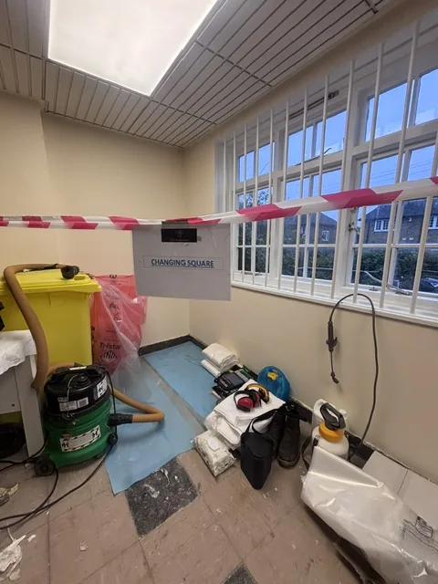 Asbestos floor tile and bitumen removal in Raynes Park